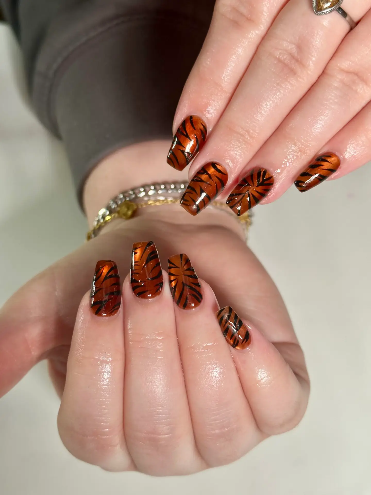 Luxury custom nail shapes with tortoise shell design at NailàCarte Chicago
