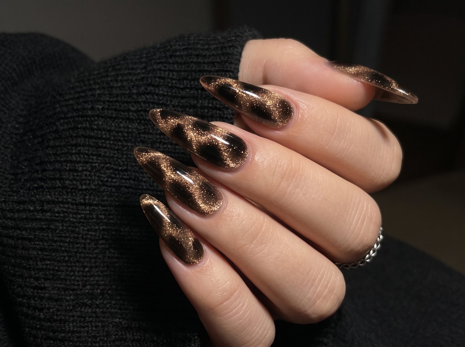cat eye nails on stiletto nails with glamorous magnetic shimmer