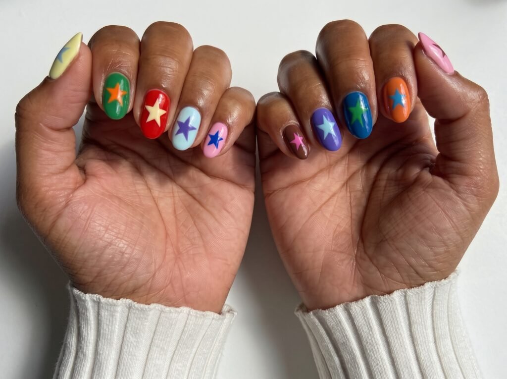 colorful star nails designs featuring the hottest nail shades of 2026