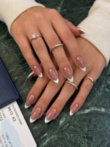 An executive travel preparation session utilizing long wear nail inspo