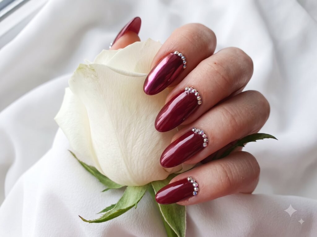 gemstone-inspired ruby nails with rich red tones