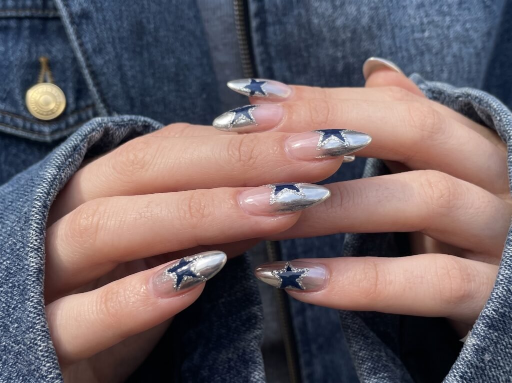 holographic worldstar nails with silver star accents