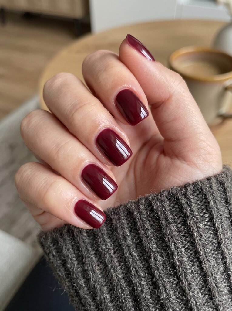 Rich burgundy and bordeaux BIAB gel overlay featuring high-end september nail ideas river north at NailàCarte.