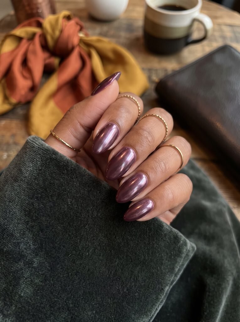Glazed plum-burgundy chrome pearl finish creating multidimensional burgundy fall nails West Loop.