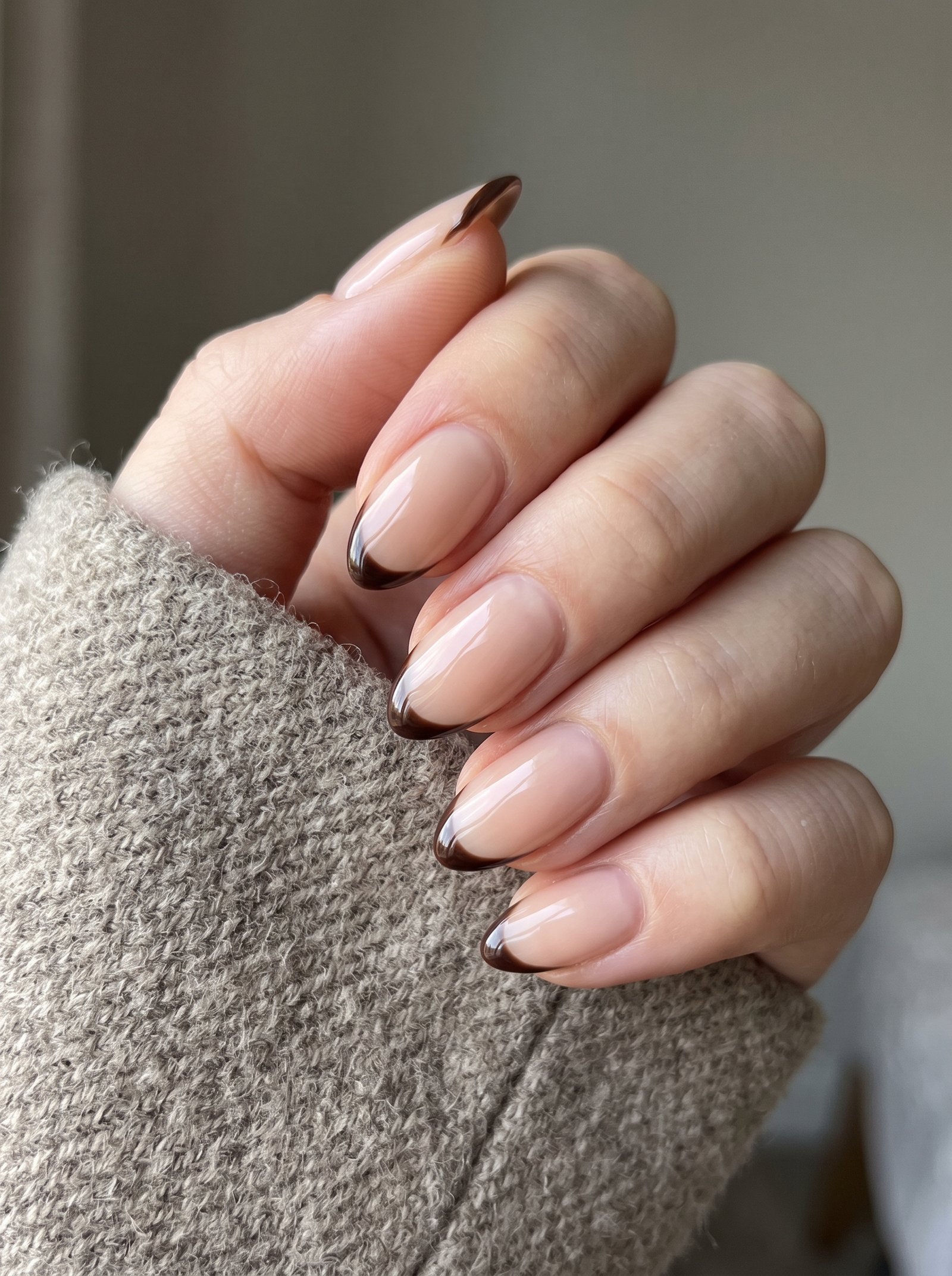 Dark roast espresso micro-French tips showcasing minimalist fall nail designs 2026 at NailàCarte.