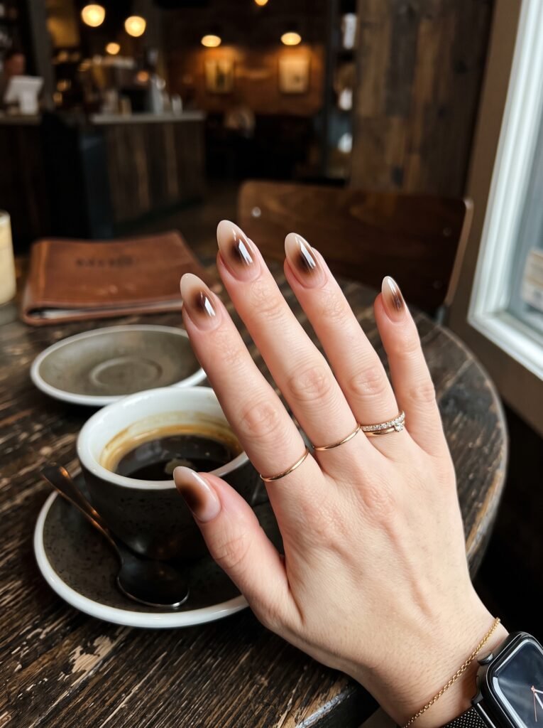 Diffused dark espresso aura halo manicure featuring modern classy nail designs River North at NailàCarte.