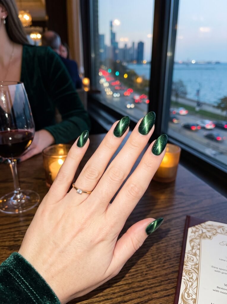 Velvet forest green magnetic cat-eye gel polish featuring dynamic fall nail designs 2026.