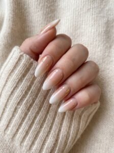 Chic custom almond nail shape with soft rounded points tailored at NailàCarte.