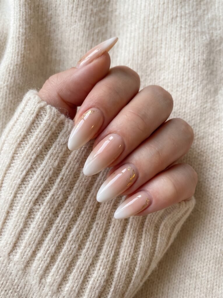 Chic custom almond nail shape with soft rounded points tailored at NailàCarte.