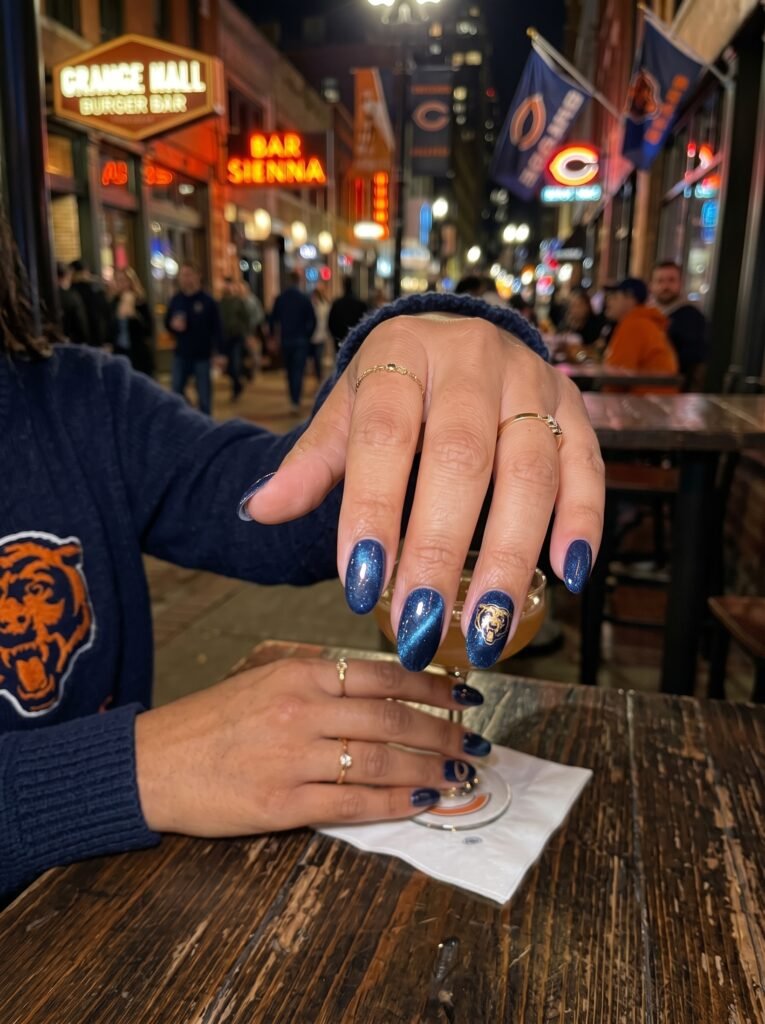Velvet magnetic navy cat-eye accent nail art highlighting dynamic Chicago Bears nail designs.