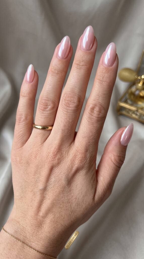 Translucent ghost rose chrome pearl finish highlighting elegant fall nail designs at NailàCarte.