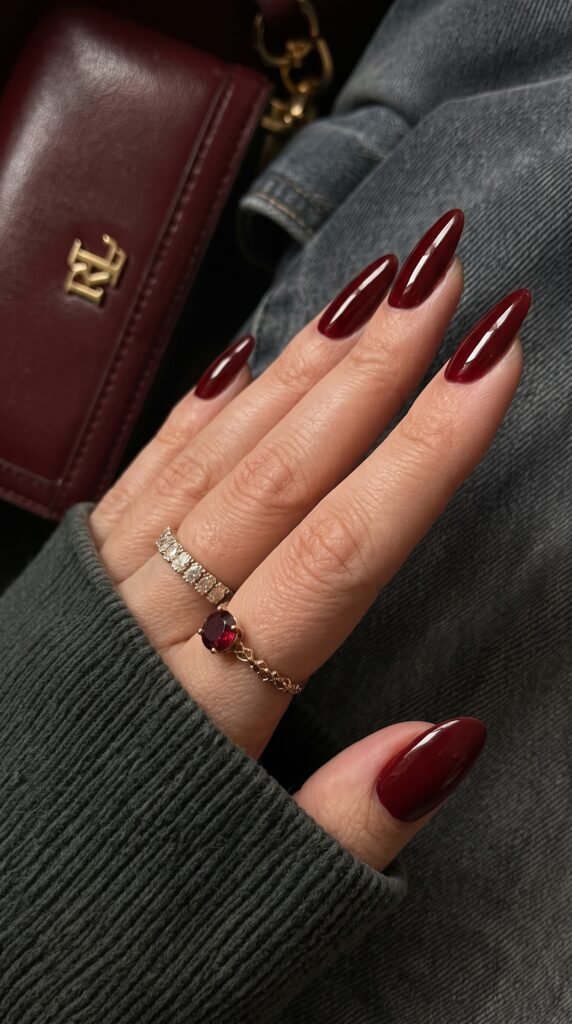 Deep oxblood and rich burgundy pedicure showcasing classic fall toe nail colors at NailàCarte.