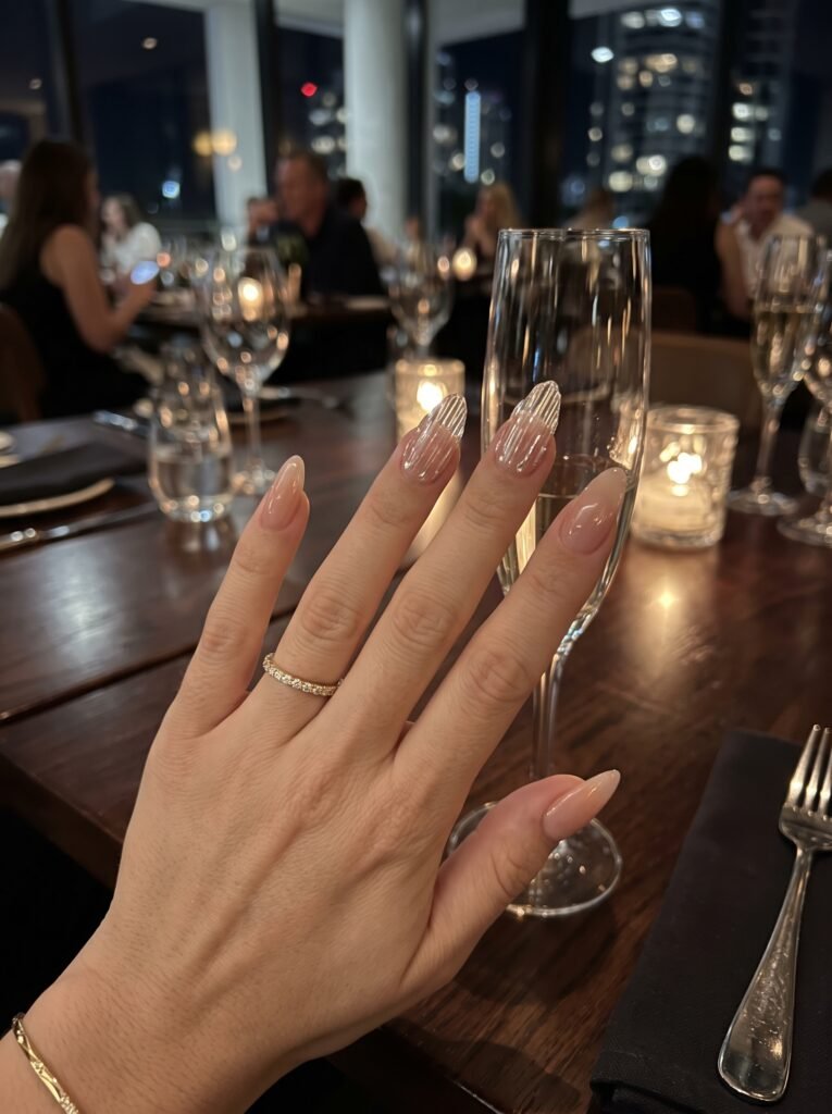 Baccarat crystal 3D glass ribs sculpted over medium almond Gel-X nails, showcasing gel-x nails Gold Coast trends.