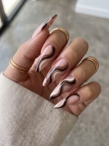 3D liquid molten gold drips over a velvety matte slate-grey dip powder base.