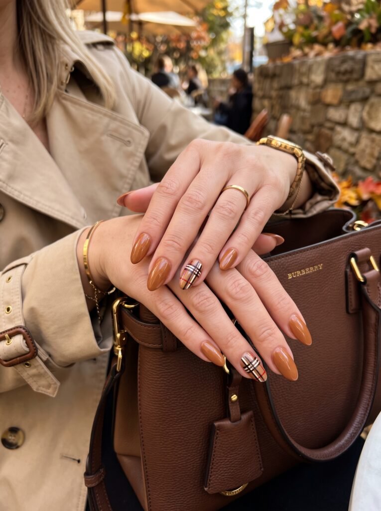Hand-painted Burberry plaid accents on a smooth caramel dip powder base.