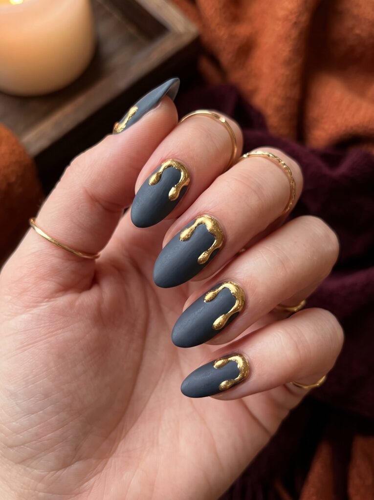 Molten Gold Liquid Drips on Velvet Matte Slate gel manicure highlighting good fall nail colors in Streeterville at NailàCarte.