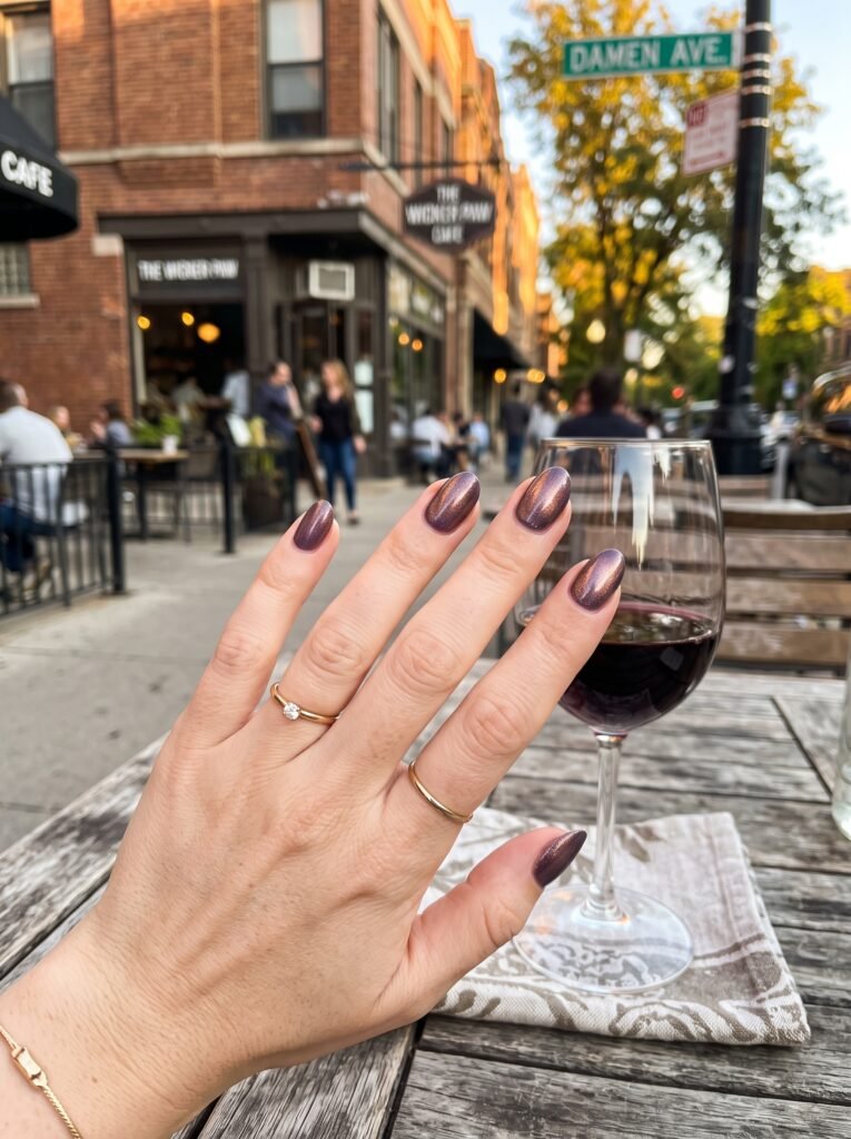 Muted fig purple nails with vintage cabernet chrome shimmer, a sophisticated Wicker Park fall look.