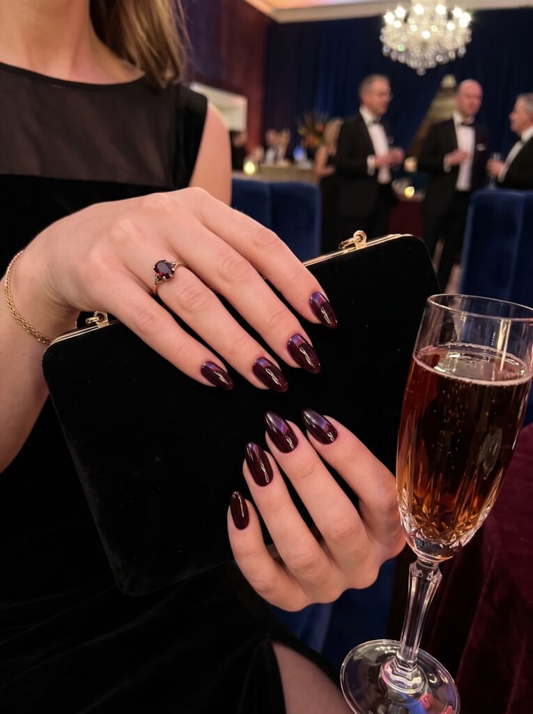 Dark Plum & Cherry Cola High-Gloss gel manicure showcasing good fall nail colors in Streeterville at NailàCarte.